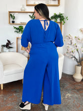Double Take Full Size Surplice Wide Leg Jumpsuit with Pockets - MyEmpired