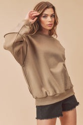 Aemi + Co Exposed Seam Round Neck Drop Shoulder Sweatshirt - MyEmpired