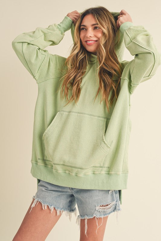 Aemi + Co Exposed Seam Side Slit Hoodie with Kangaroo Pocket - MyEmpired