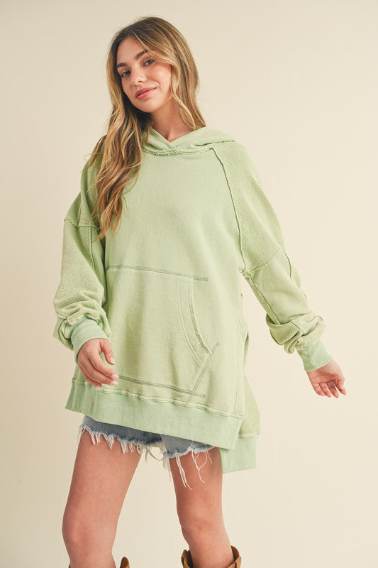 Aemi + Co Exposed Seam Side Slit Hoodie with Kangaroo Pocket - MyEmpired