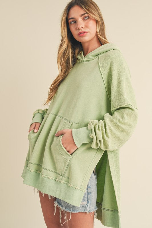 Aemi + Co Exposed Seam Side Slit Hoodie with Kangaroo Pocket - MyEmpired