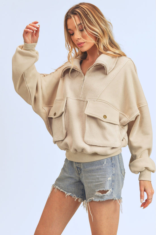 Aemi + Co Exposed Seam Half Zip Sweatshirt with Pockets - MyEmpired